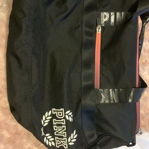 Small. Pink/Victoria’s Secret duffle bag.